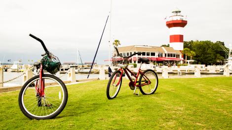 Biking in front of The Harbour Town Lighthouse in Hilton Head Island, South Carolina