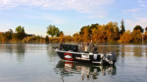 Celebrating a catch aboard Intimidator Sportsfishing Fishing Charter in Sacramento