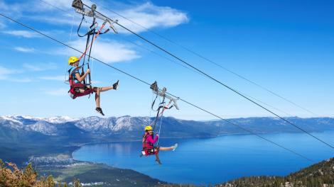 Zip liners are treated to an incredible view of the gem-colored waters of Lake Tahoe Zip liners are treated to an incredible view of the gem-colored waters of Lake Tahoe
