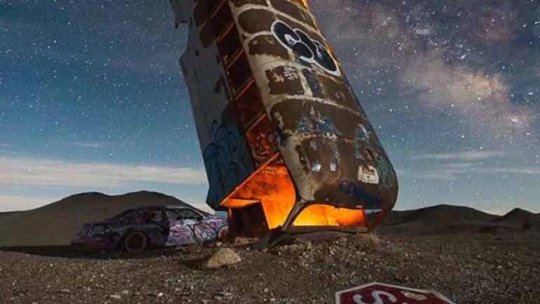 The eerie International Car Forest, a roadside attraction in Goldfield The eerie International Car Forest, a roadside attraction in Goldfield