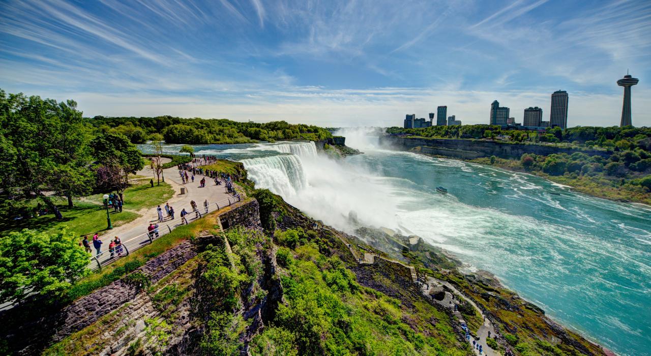 Experiencing a natural wonder as the American Falls crash into the Niagara River Experiencing a natural wonder as the American Falls crash into the Niagara River