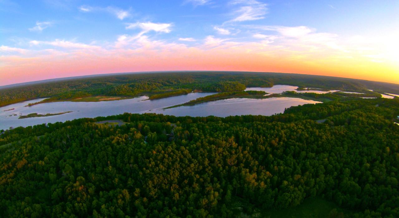 Lake Superior waterways and surrounding forest at sunset Lake Superior waterways and surrounding forest at sunset
