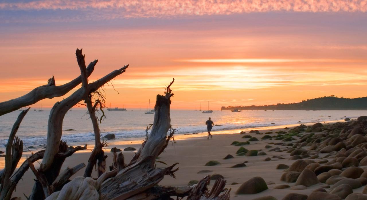 Jogging at sunset along the shoreline