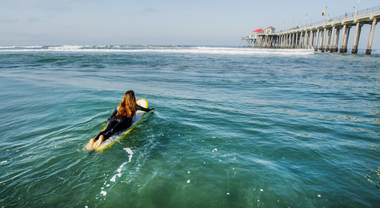 Paddling out to surf in the city that made it famous Paddling out to surf in the city that made it famous