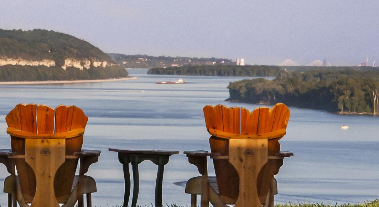 Adirondack chairs overlooking the Mississippi River