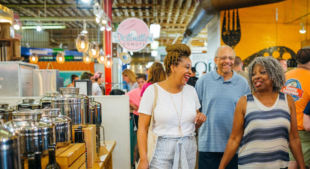 Family browsing the North Market public market Family browsing the North Market public market